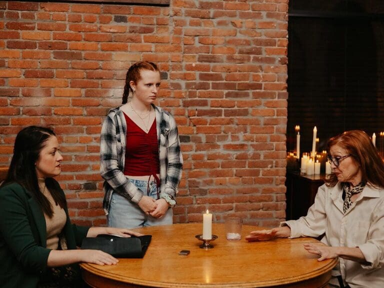 From The Rope Trick - three women at a table