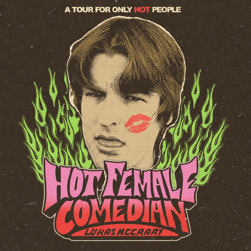 Poster for a tour featuring a male comedian with a lipstick kiss mark on the cheek, green flames behind, and bold pink title reading 'Hot Female Comedian' with the name 'Lukas McCary' at the bottom.