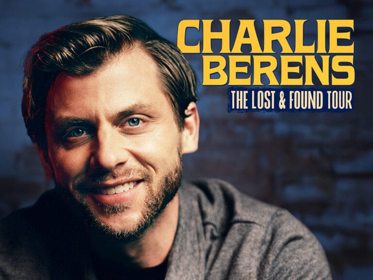 Promotional poster of comedian Charlie Berens promoting 'The Lost & Found Tour' with a close-up of his smiling face.